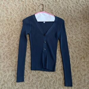 Beautiful woman’s ribbed v neck sweater . Color is slate and 3 button front